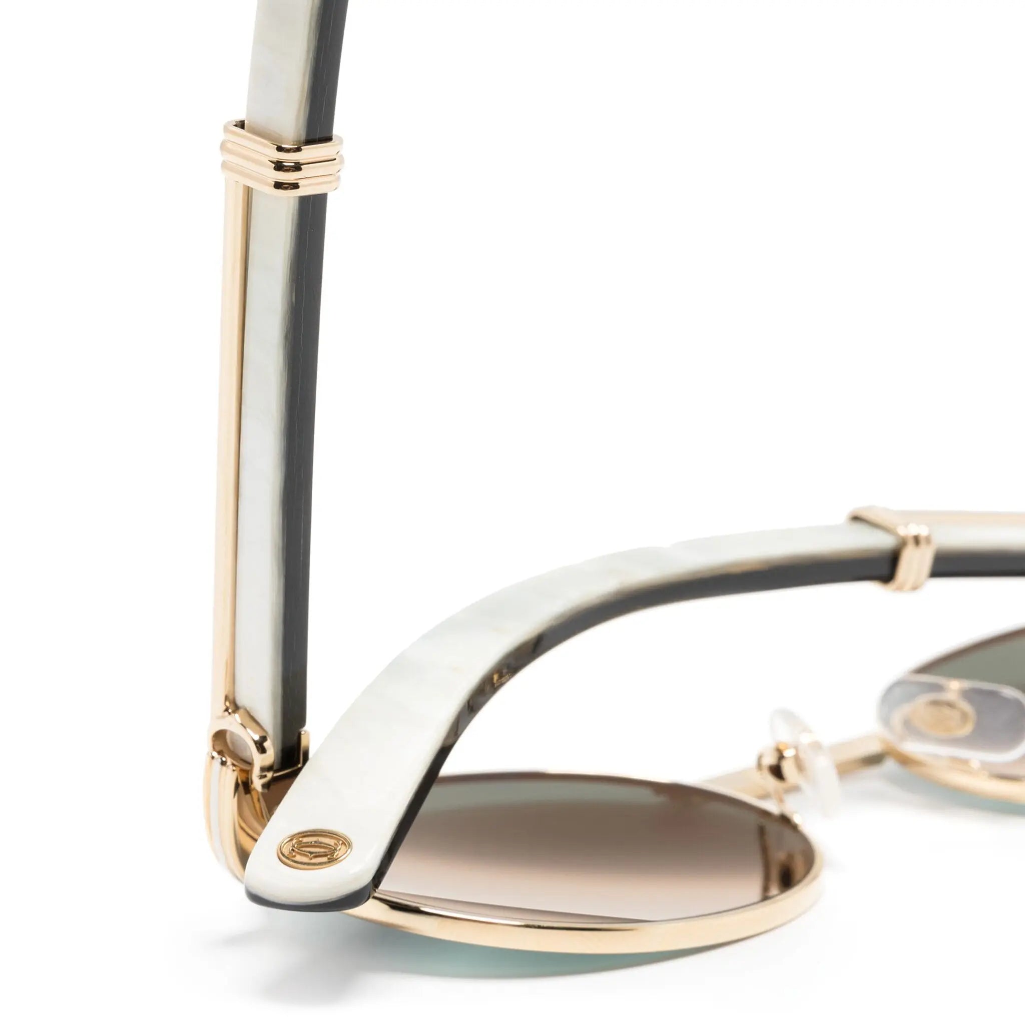 Detail view of Cartier Eyewear CT0464S-003 White Gold Green Sunglasses